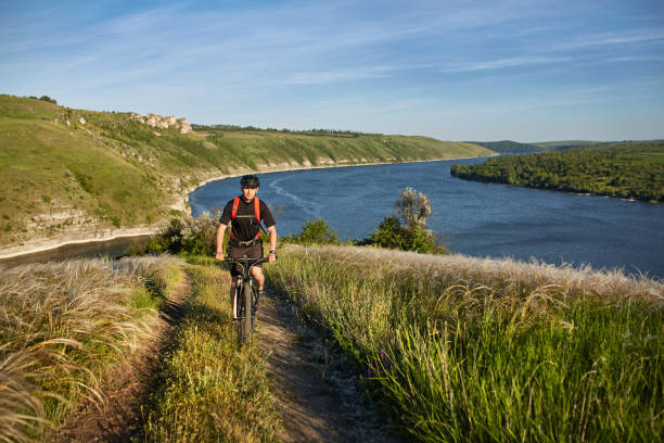 istock Traveler has adventur on meadow on riverside 874200932