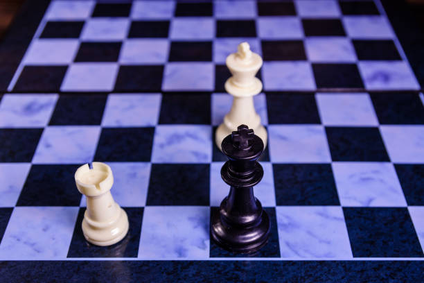 istock Composition of the chess pieces on a chess board 874201344