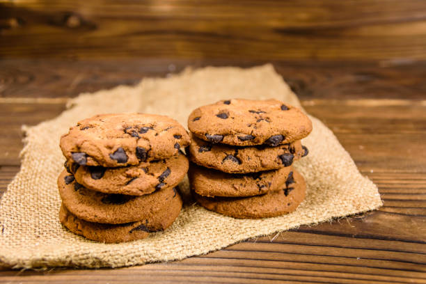 istock Chocolate chip cookies on sackcloth on a wooden table 874201370