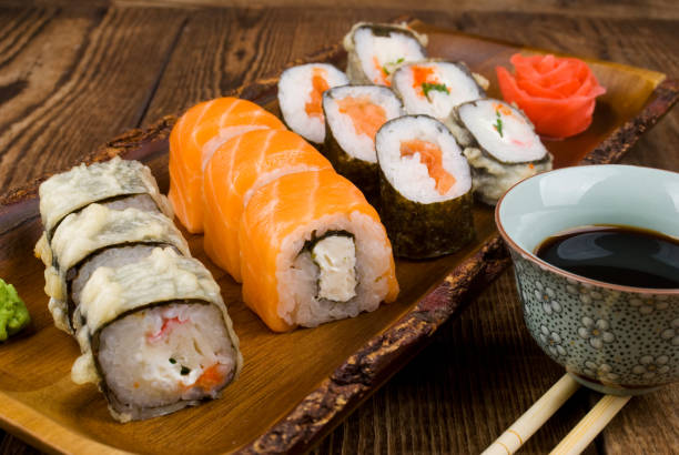 istock sushi on wooden table 874205820