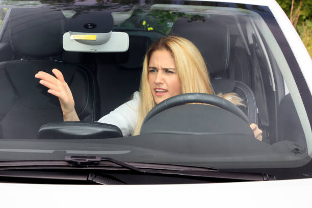 istock Woman is driving her car 874209296
