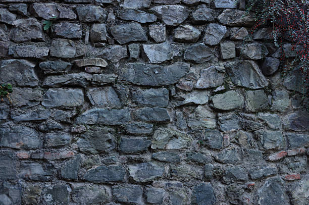 Old stone wall surface stock photo