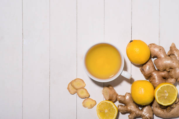 istock Healthy ginger tea ingredients on a wooden table 874219048