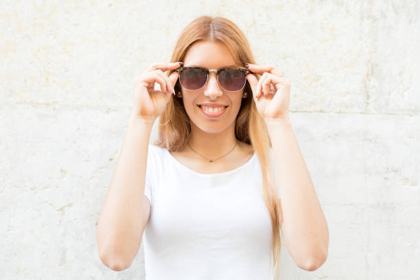 istock Positive confident girl wearing cool sunglasses 874222176