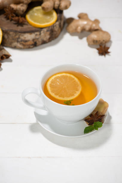 istock Healthy ginger tea ingredients on a wooden table 874222208