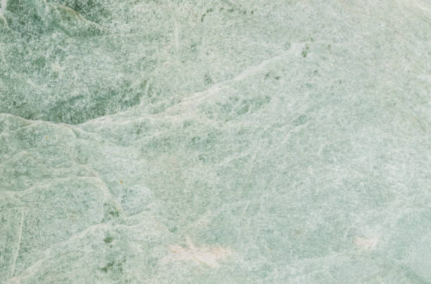 istock Closeup surface abstract marble pattern at the green marble stone floor textured background 874225774