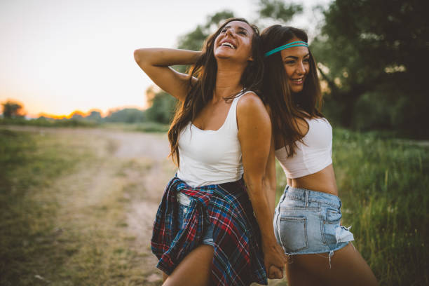 istock Young women having great time in the nature 874225788