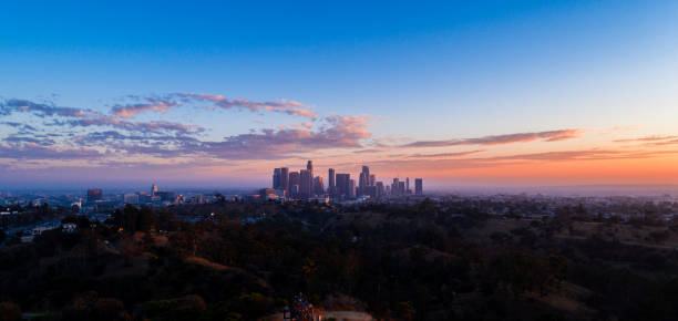 istock Panoramic view of Los Angeles downtown skyline at sunset 874237718