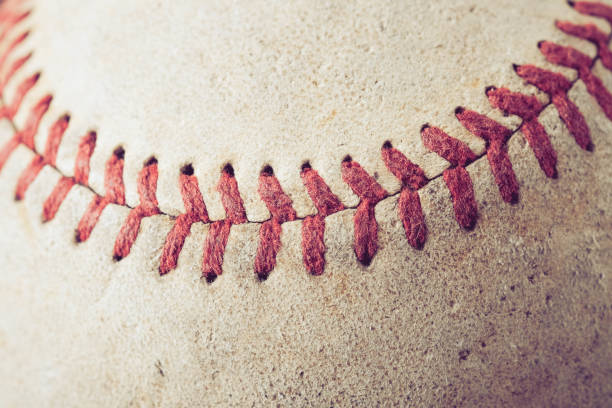 istock old Baseball on wood background with filter effect retro vintage style 874238166