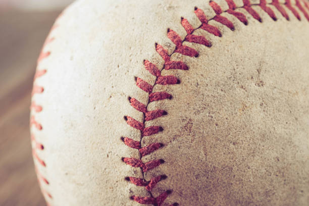 istock old Baseball on wood background with filter effect retro vintage style 874238194
