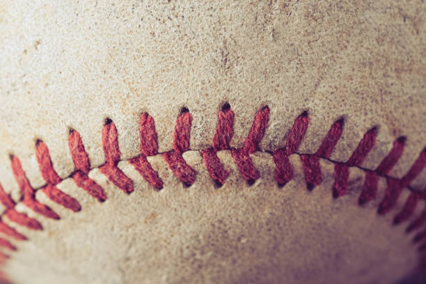 istock old Baseball on wood background with filter effect retro vintage style 874238208