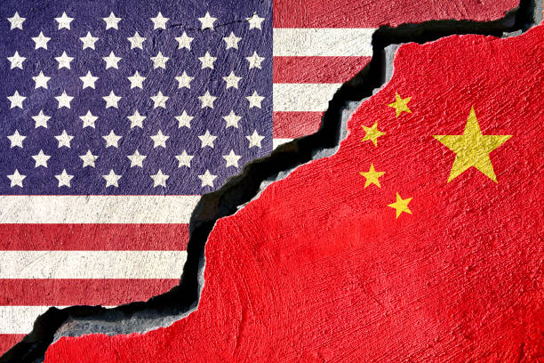 istock Concept american and China flag on cracked background 874244192
