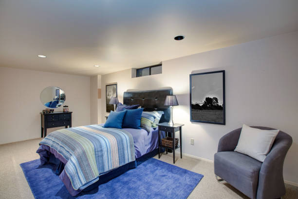 istock Adorable boy's bedroom design with ivory painted walls, 874244312