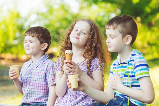 istock Children enjoy eating ice cream 874250716