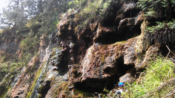 istock unique rocky cliffs full of bulges 874254284