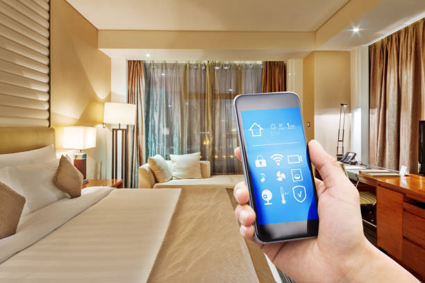 istock smart phone with smart home with modern bedroom 874257570