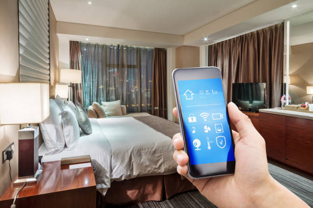 istock smart phone with smart home with modern bedroom 874257998
