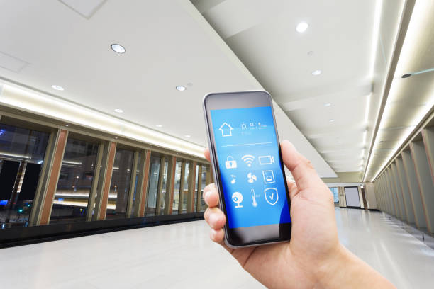 istock smart phone with smart home with modern corridor 874258388