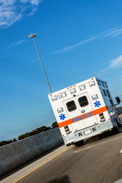 istock Ambulance Medical Emergency Services Vehicle Speeding on Expressway 874258792