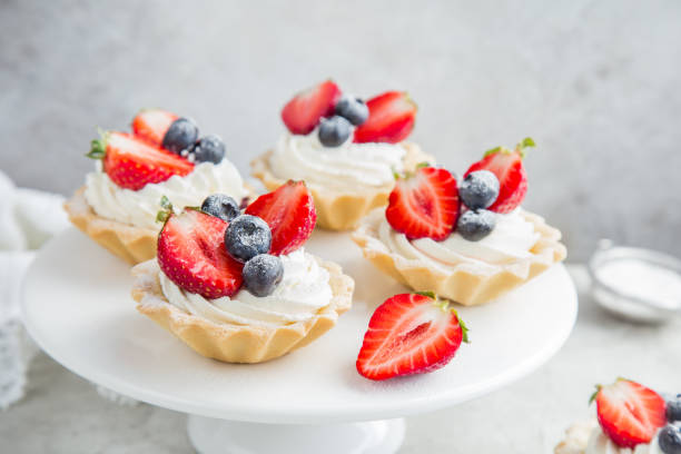 istock tartlets with cream cheese and fresh berries 874259396
