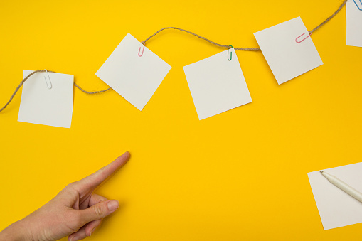 Notes On String Posts Empty Notes On A String The Hand Points To One Of Them Stock Photo ...