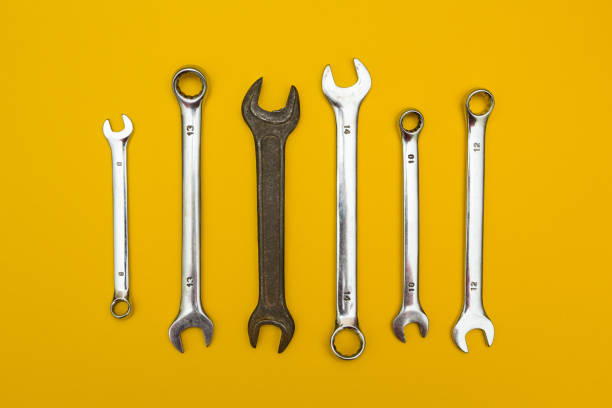 istock New shiny wrenches and one old rusty one. 874266948