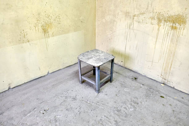 istock chair in an empty room 874266960