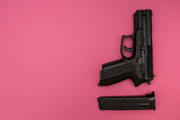 istock Black pistol with a store for women's self-defense. 874271410