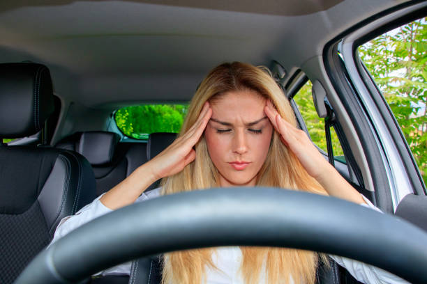 istock Woman is driving her car 874278270