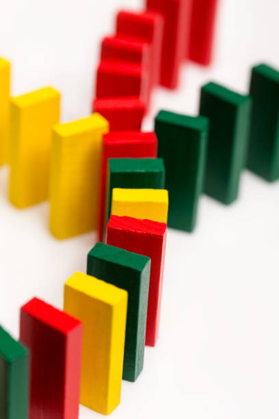 istock colorful dominos on white background coming together 874279236
