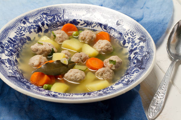 istock Rustic soup with turkey meatballs, carrots and potatoes 874290044