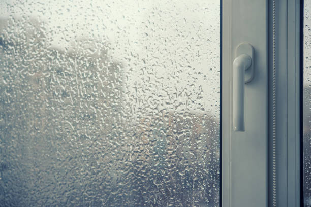 istock plastic window in drops of rain 874291202