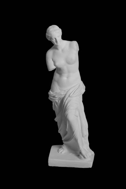 istock Statue of Venus in blue light on a black background 874294702