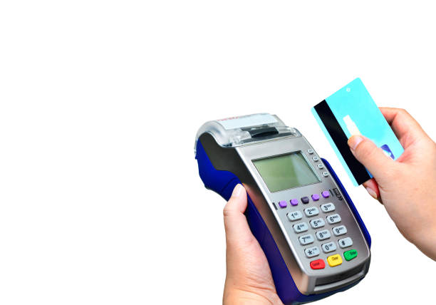 istock Paying with a credit card and using a terminal on white background 874297820