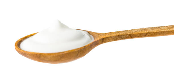 istock Yogurt on Wooden Spoon 874297878