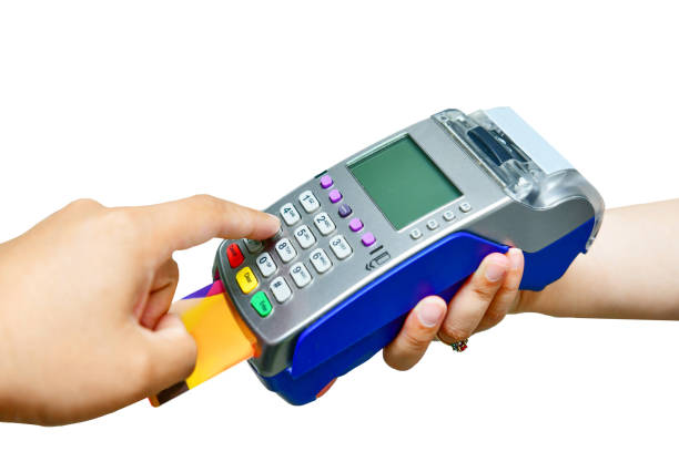 istock Paying with a credit card and using a terminal on white background 874300920