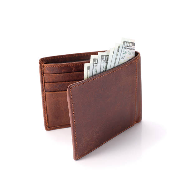istock Brown wallet with money isolated on white background 874301420