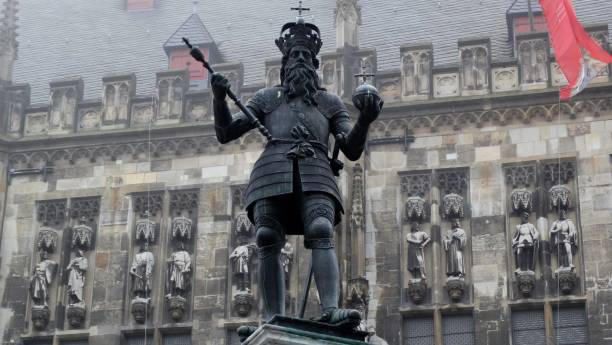Monument of Charlemagne, Charles the Great standing at the market place in the centre of Aachen emperor stock pictures, royalty-free photos & images