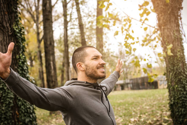 istock Sporty man with arms outstretched. 874309678