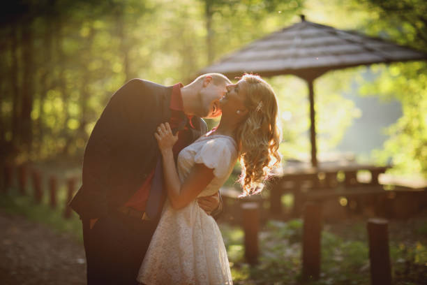 istock Young romantic couple having fun outdoors 874313214