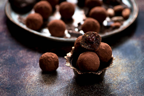 istock Chocolate candies truffles with chocolate cream 874314514