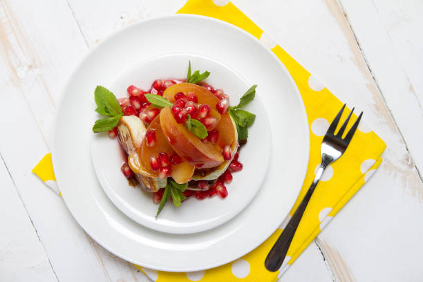 istock Cottage cheese and vanilla pancakes with apple compote, pomegranate grenadine and mint 874316818