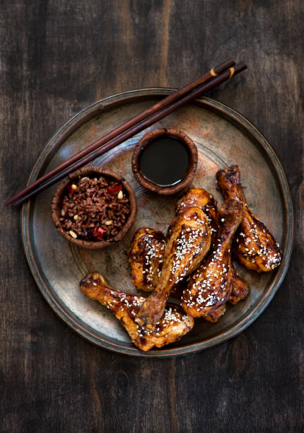 Grilled chicken drumsticks with brown wild rice