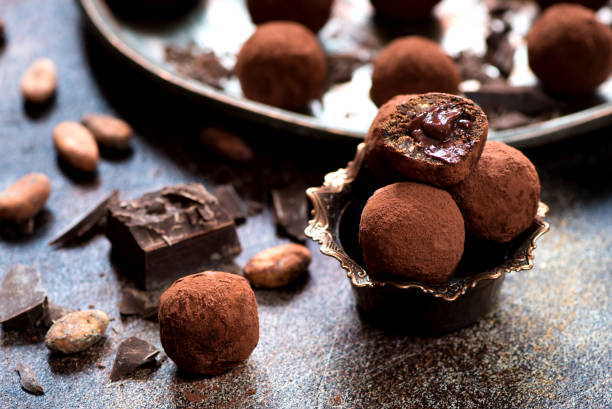 istock Chocolate candies truffles with chocolate cream 874317118