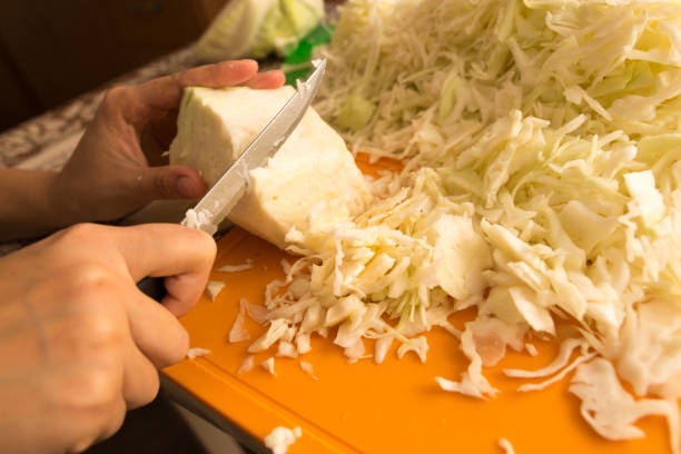 istock salting cabbage at home in the kitchen 874320980