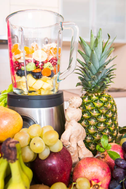 istock Blender full of mixed fruits 874322032