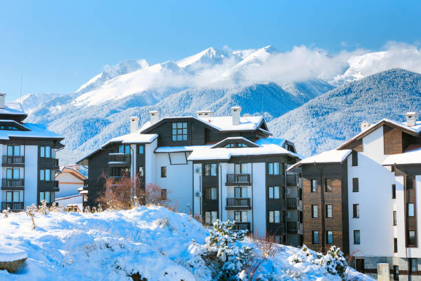 istock Houses and snow mountains in Bansko, Bulgaria 874327778