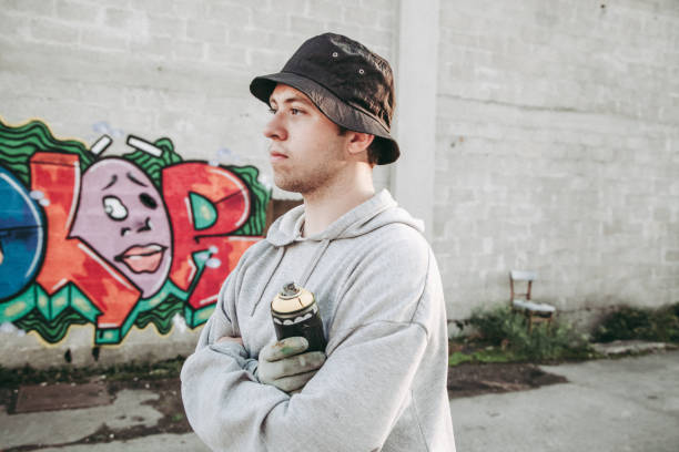 istock Graffiti Artist Holding Spray Paint 874327790