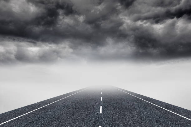 istock Stormy landscape background with street 874330756
