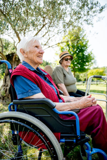 istock Senior Women Relaxing Outdoors in a Park 874332280
